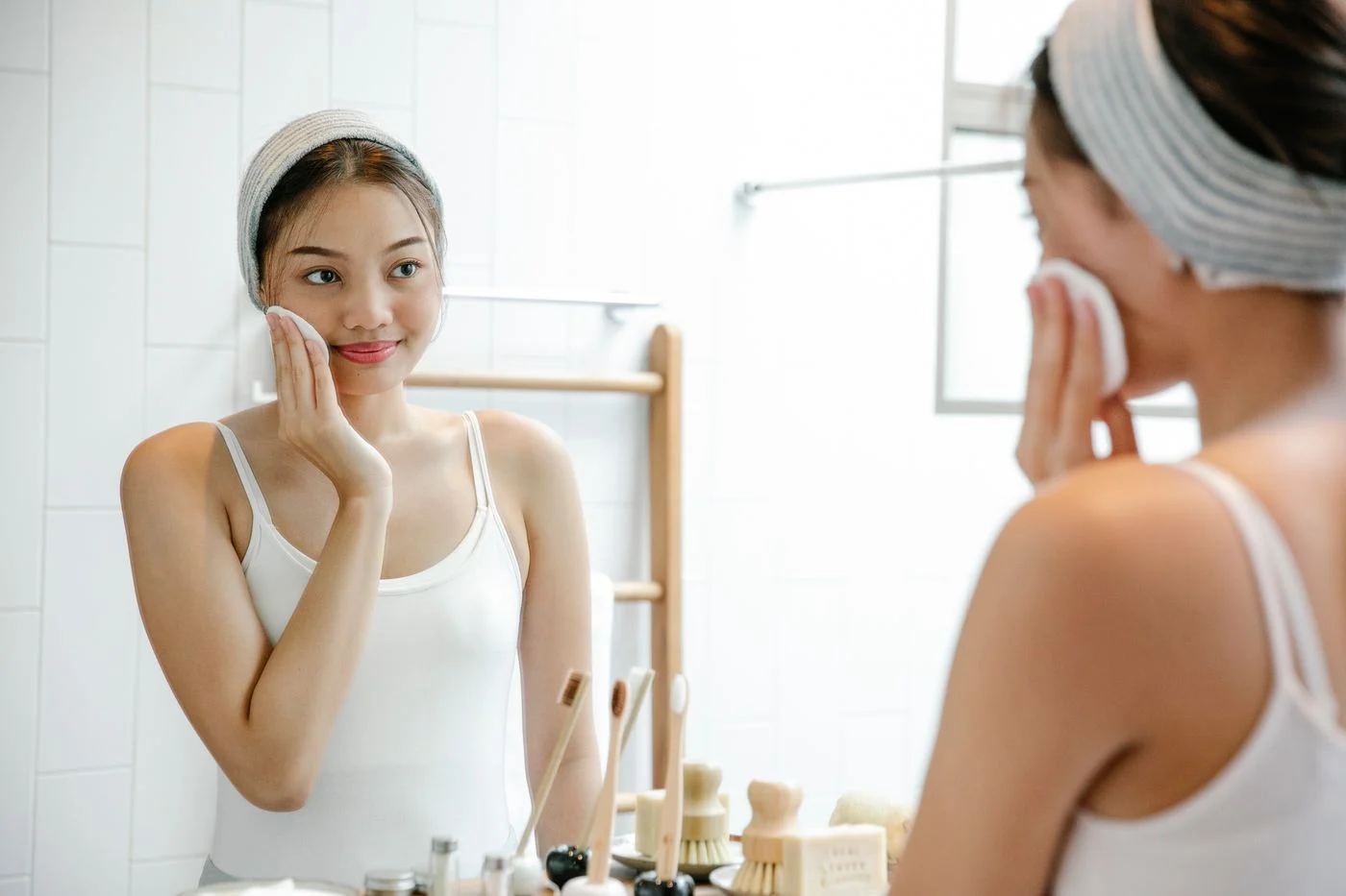 A woman enjoying her morning skincare routine